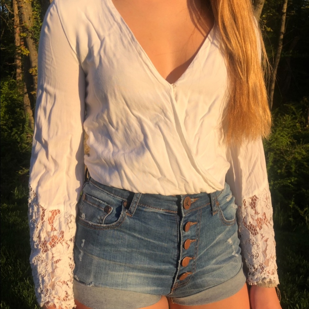 White long sleeve cropped blouse with lace